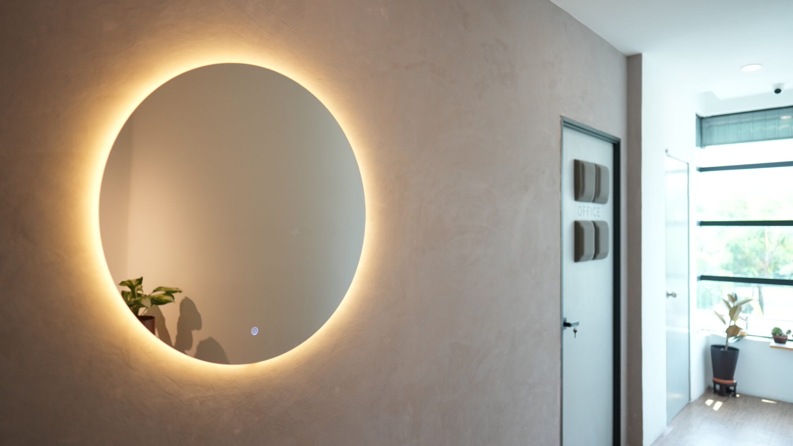 Serene Smile Dental Clinic modern interior design with illuminated mirror. Best Dental Clinic Puchong ambiance.